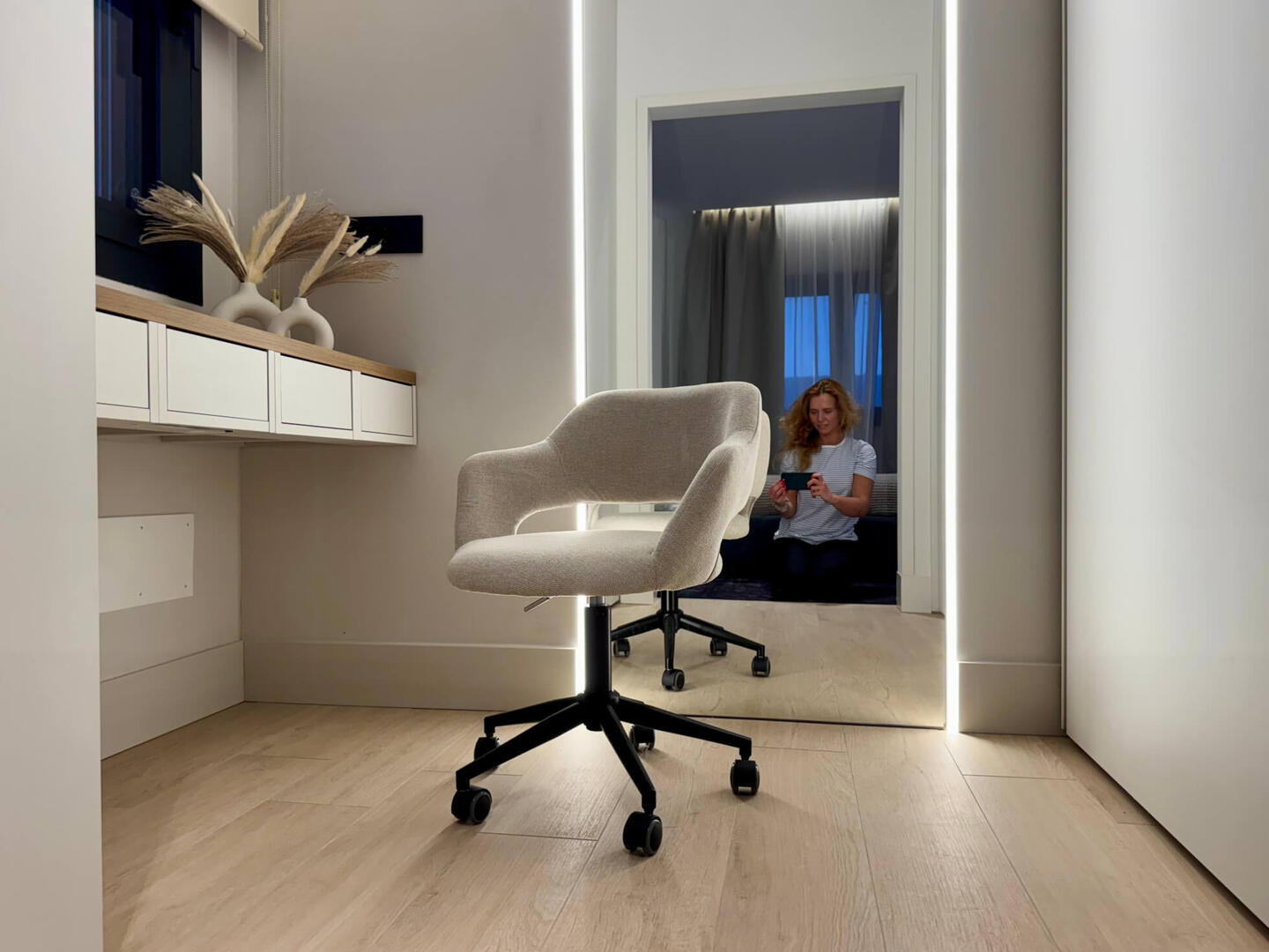 Big walk-in closet with vanity/workspace and loads of storage.